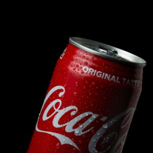 coca cola can on black background